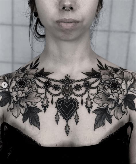 Top 10 middle breast tattoo ideas and inspiration